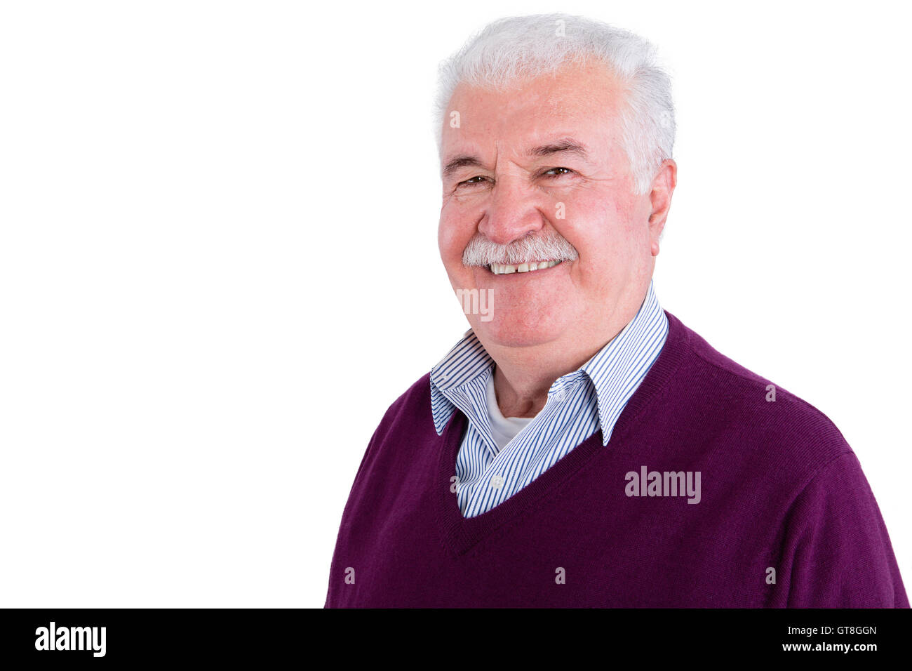 Close up Gray-Haired Senior Businessman Wearing Sweater Shirt, Smiles at Camera Against White Background. Stock Photo