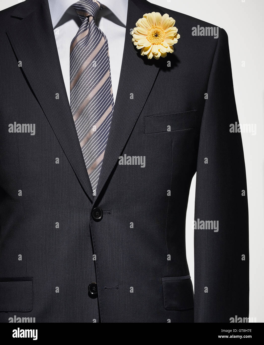 dark blue suit jacket with grey shirt 