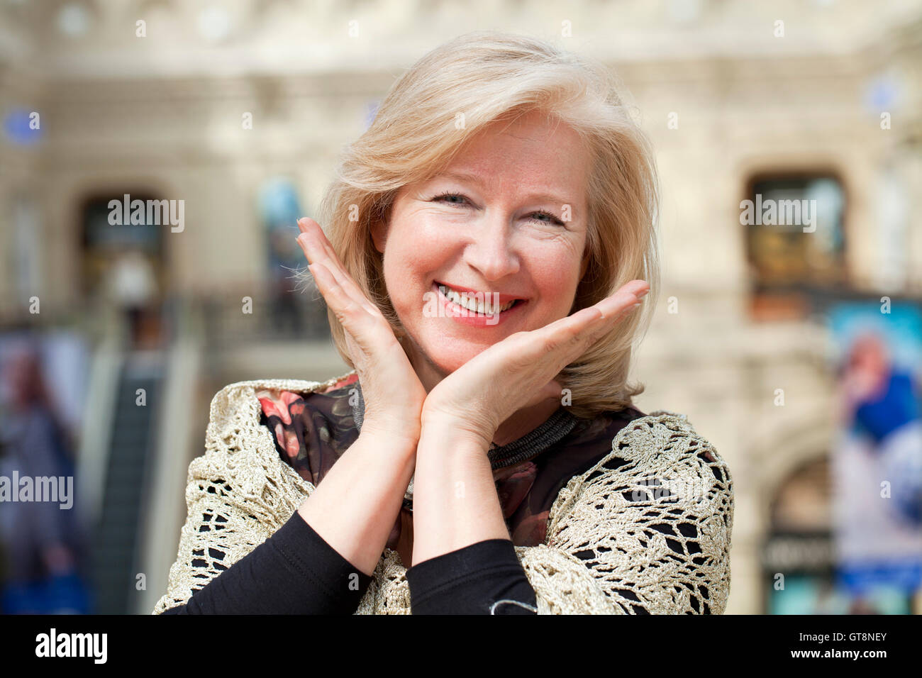 Close up facial portrait of a beautiful senior woman looking at the ...