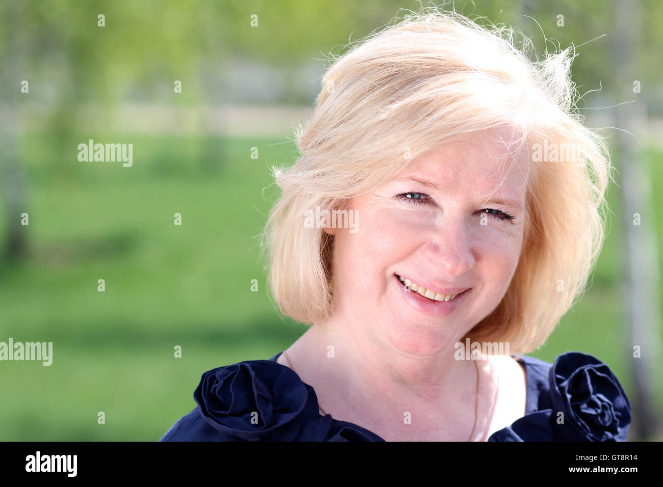 Closeup portrait of a happy mature woman Stock Photo - Alamy