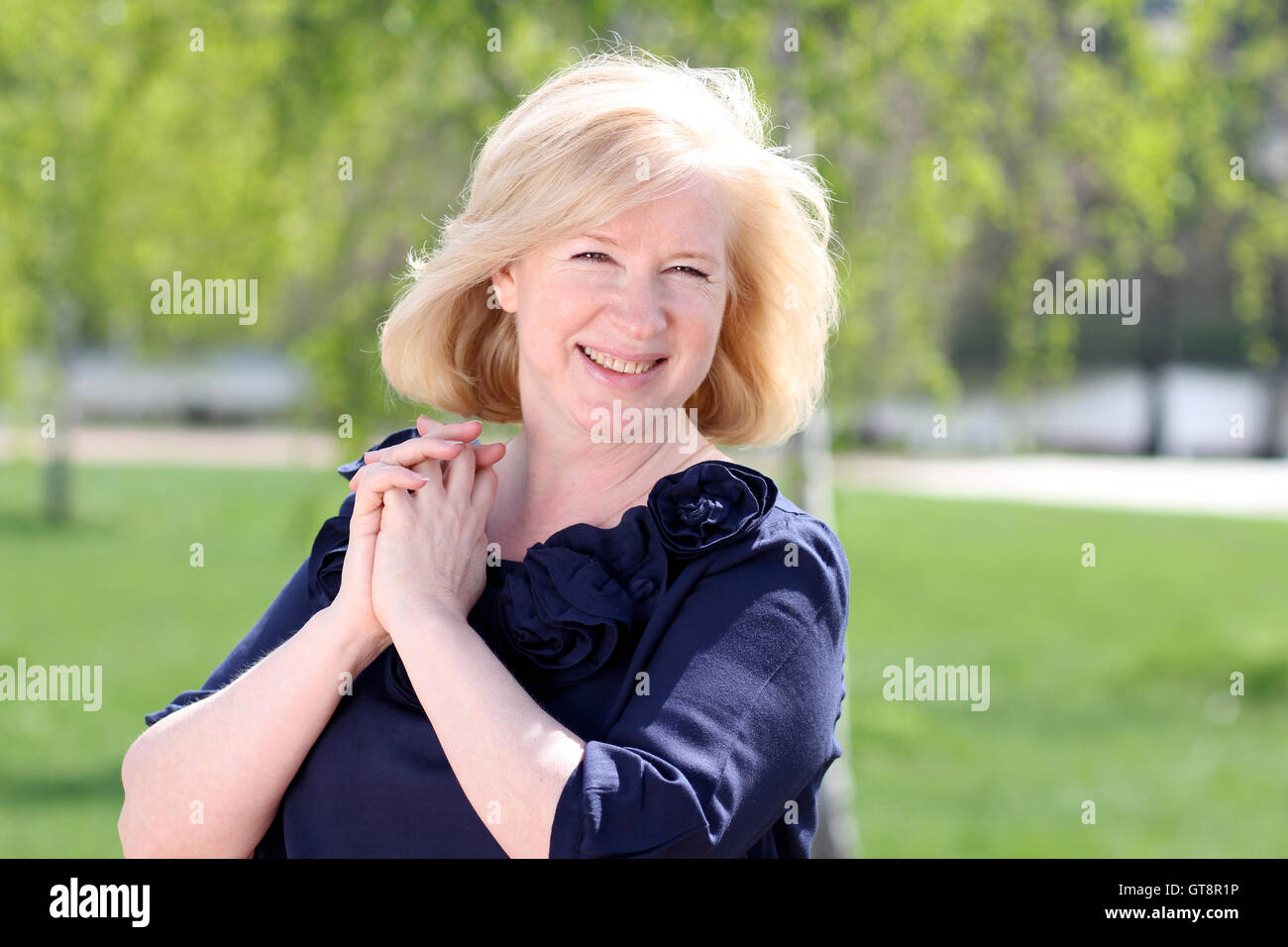 Closeup portrait of a happy mature woman Stock Photo - Alamy