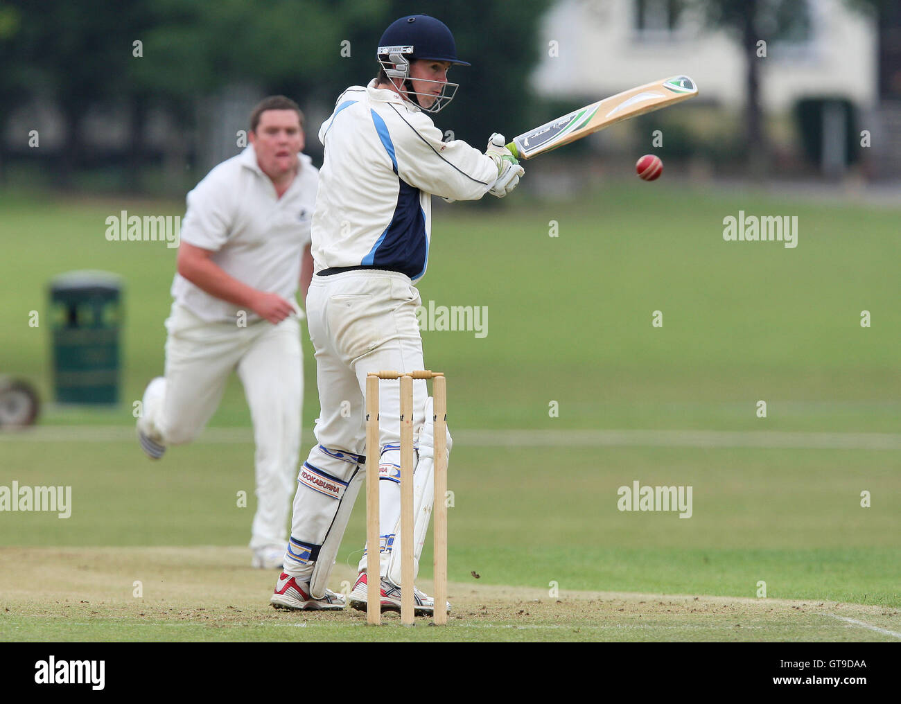 Alan Ison of Upminster bowls to Robert Marshall - Upminster CC vs Woodford Wells CC - Essex Cricket League - 06/06/09. Stock Photo