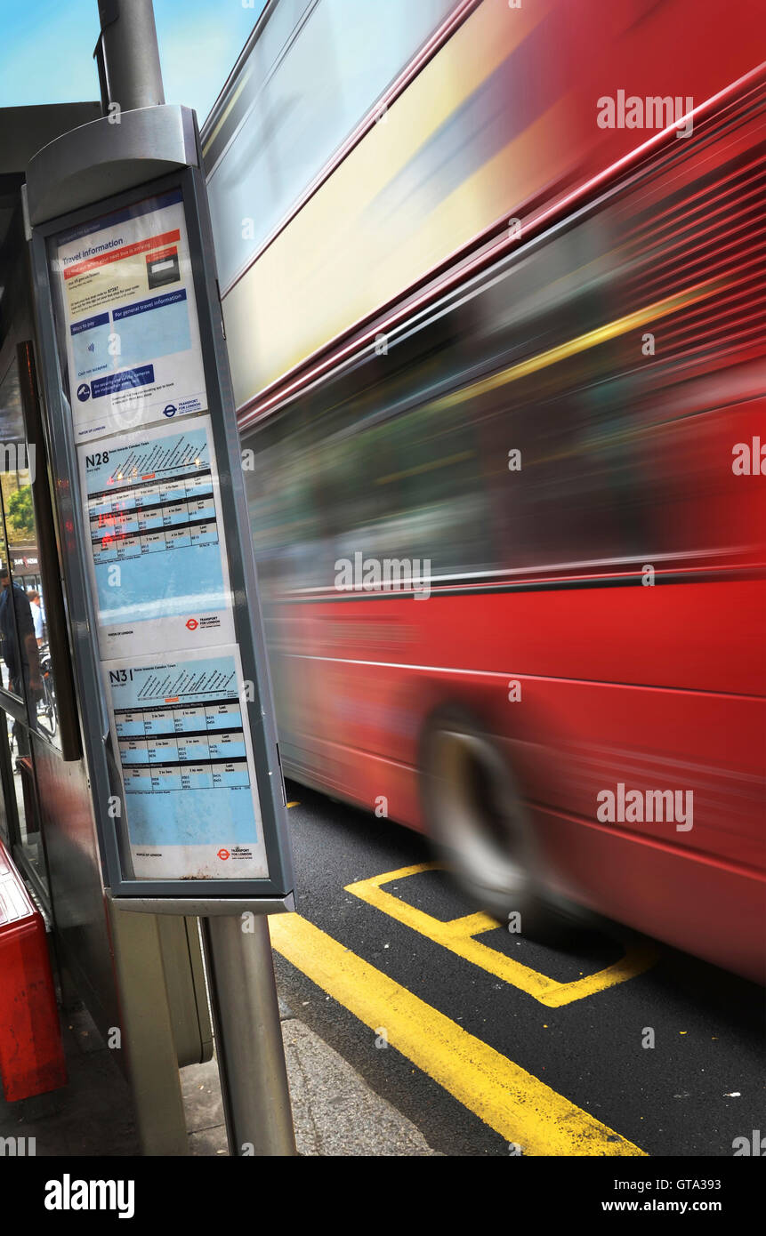 Double Decker Bus Speeding by Schedule, London, England, UK Stock Photo
