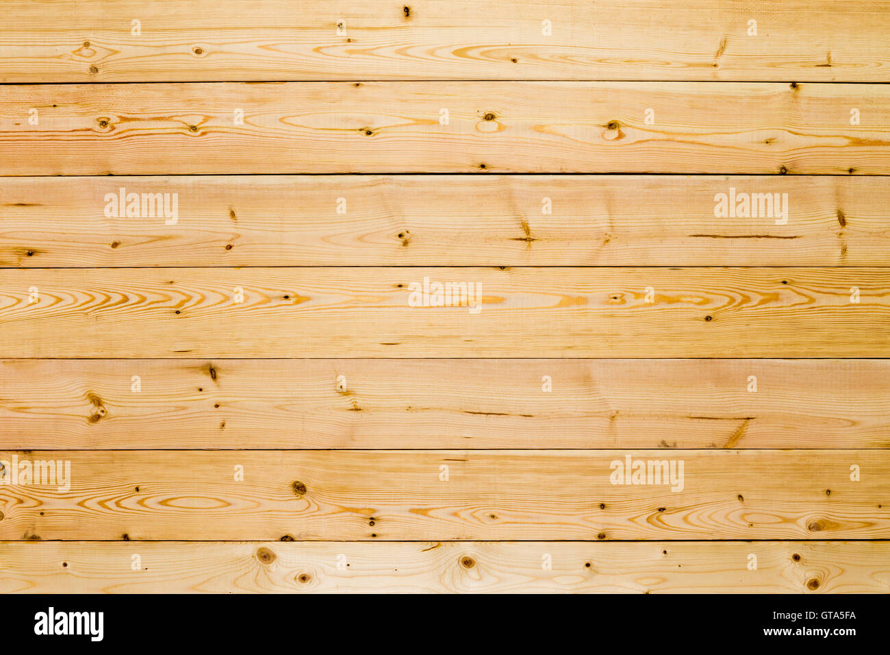 Plain clean natural wooden boards or panel background texture in an overhead full frame view Stock Photo
