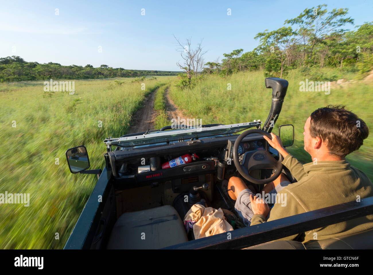 A guide on an african safari in Zimbabwe. Stock Photo