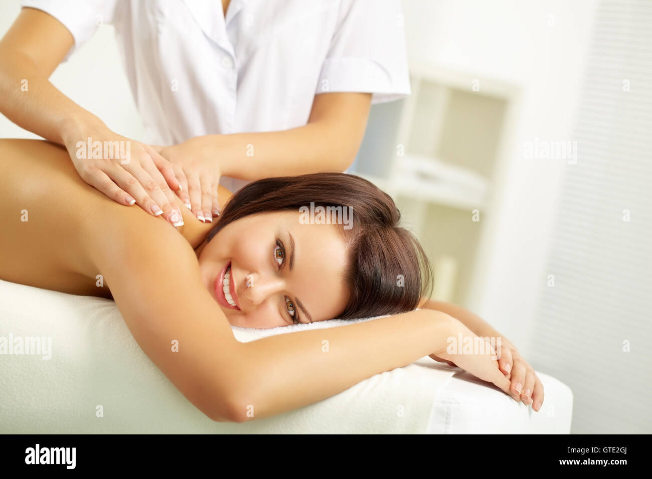 Woman at massage salon Stock Photo
