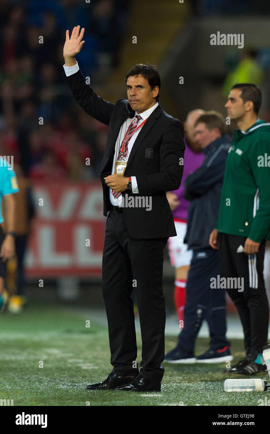 Wales manager Chris Coleman waves during the Wales v Moldova world cup qualifier game at the Cardiff City Stadium. Stock Photo