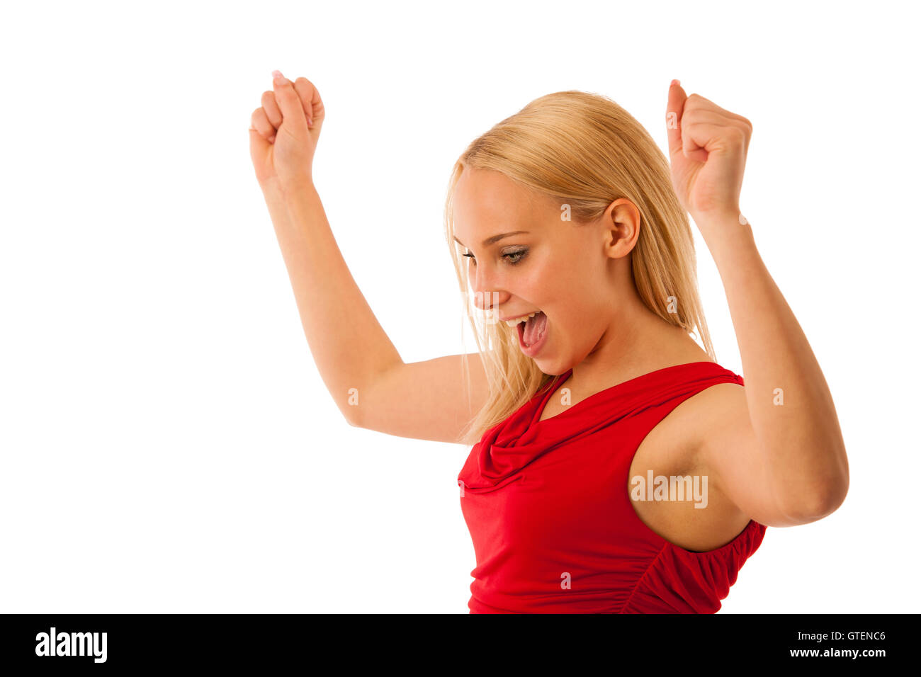 Successful business woman gestures success with hands rised in the air isolated over white background Stock Photo