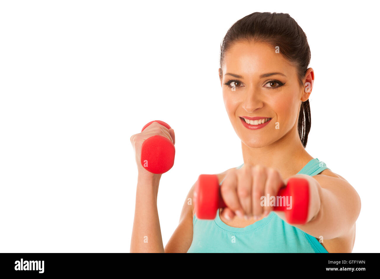 active woman with dumbbells workout in fitness gym isolated over white background Stock Photo