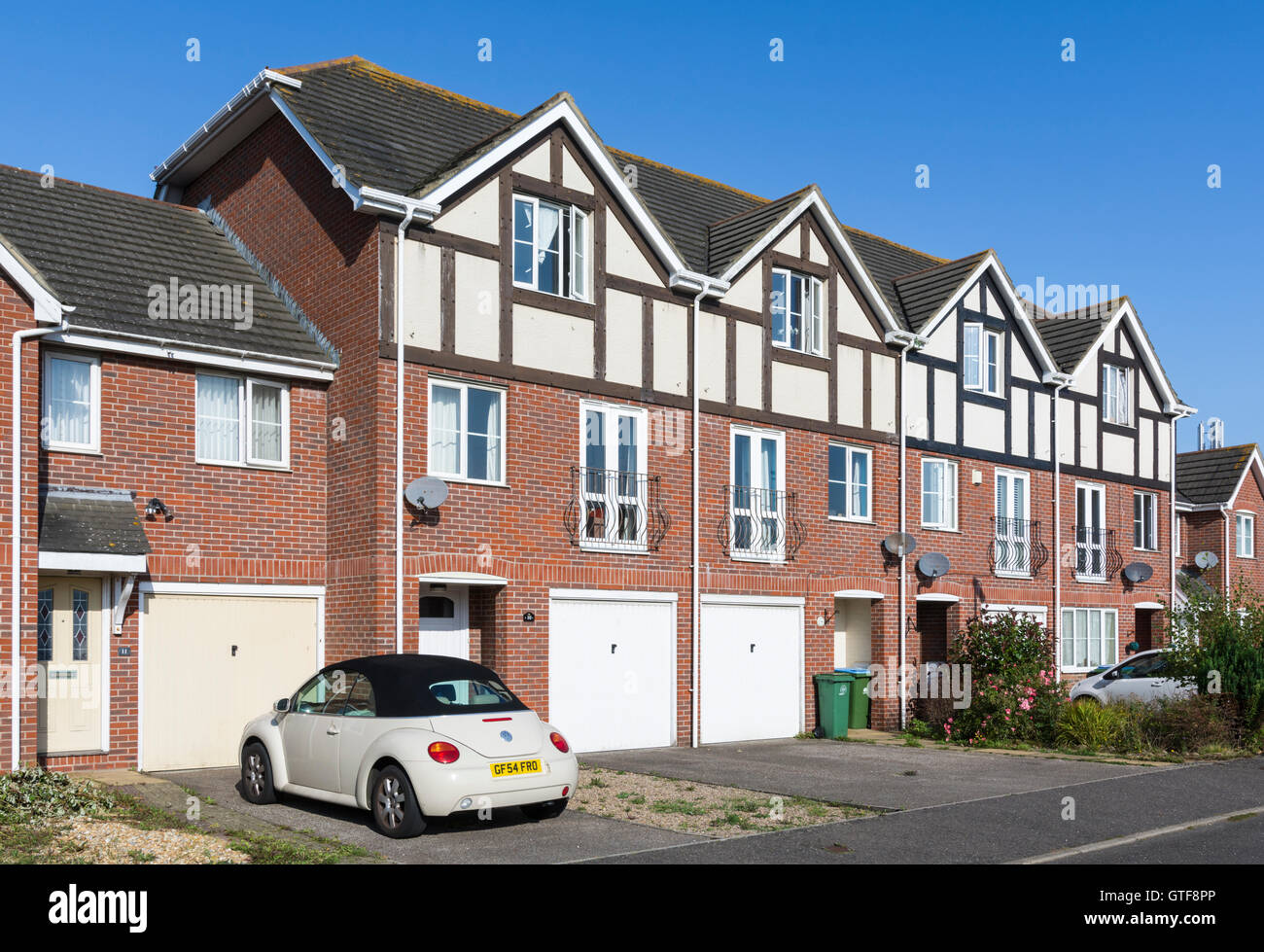 Terrace of townhouses in a town in the UK. Stock Photo