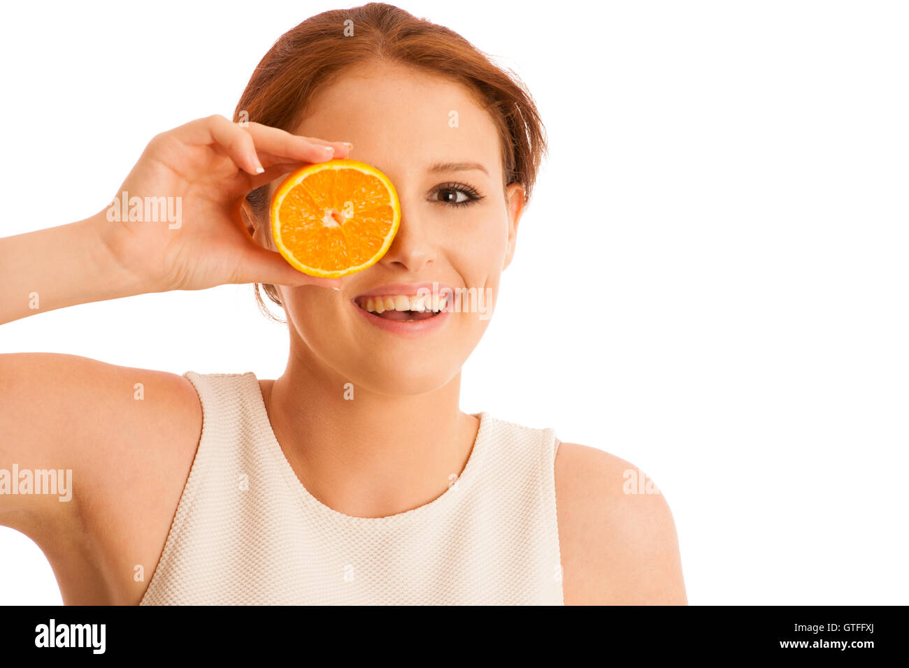 c-vitamine woman - girl with orange fruit in front of her face Stock Photo
