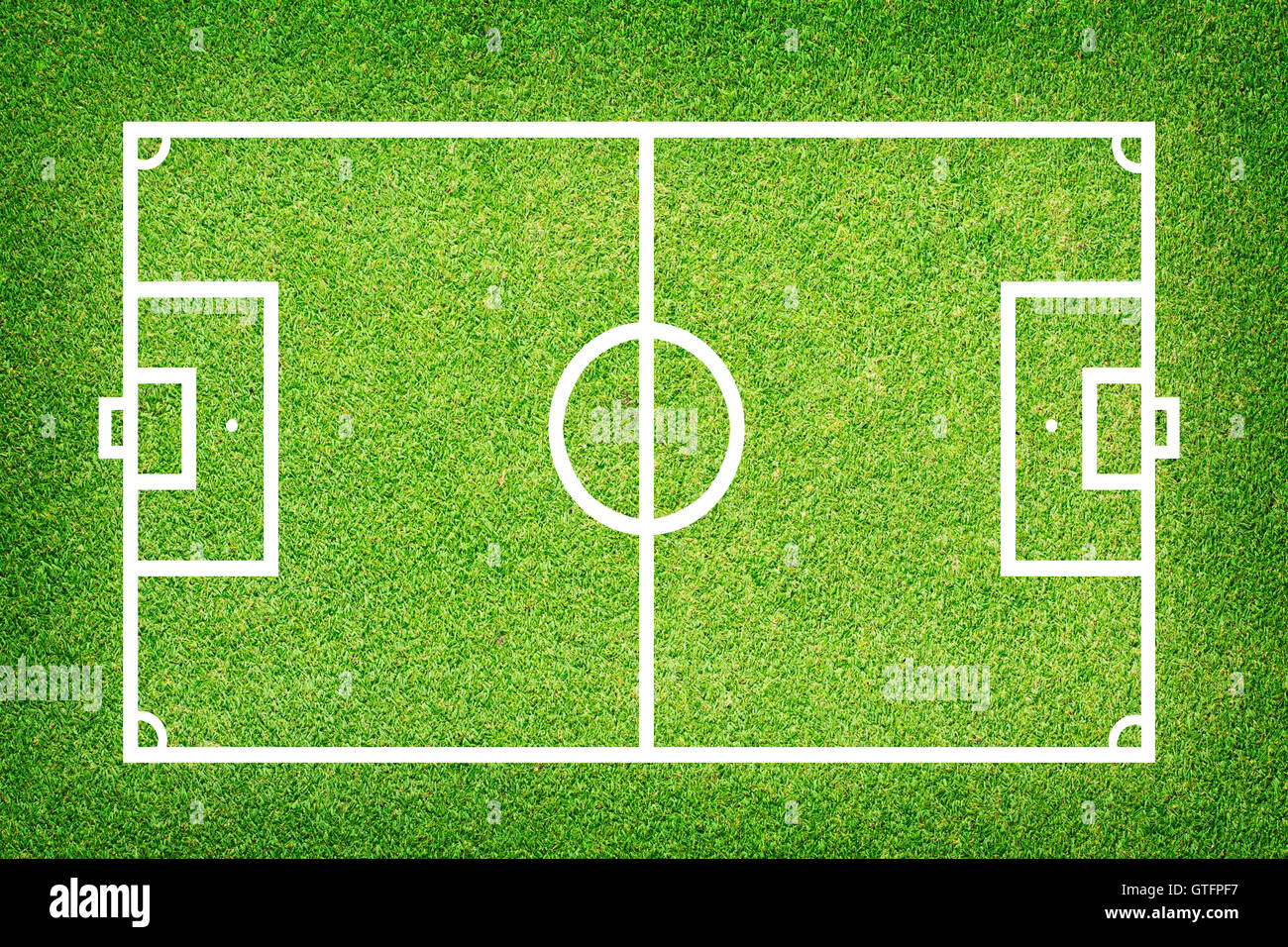 Soccer football on grass field Stock Photo Alamy