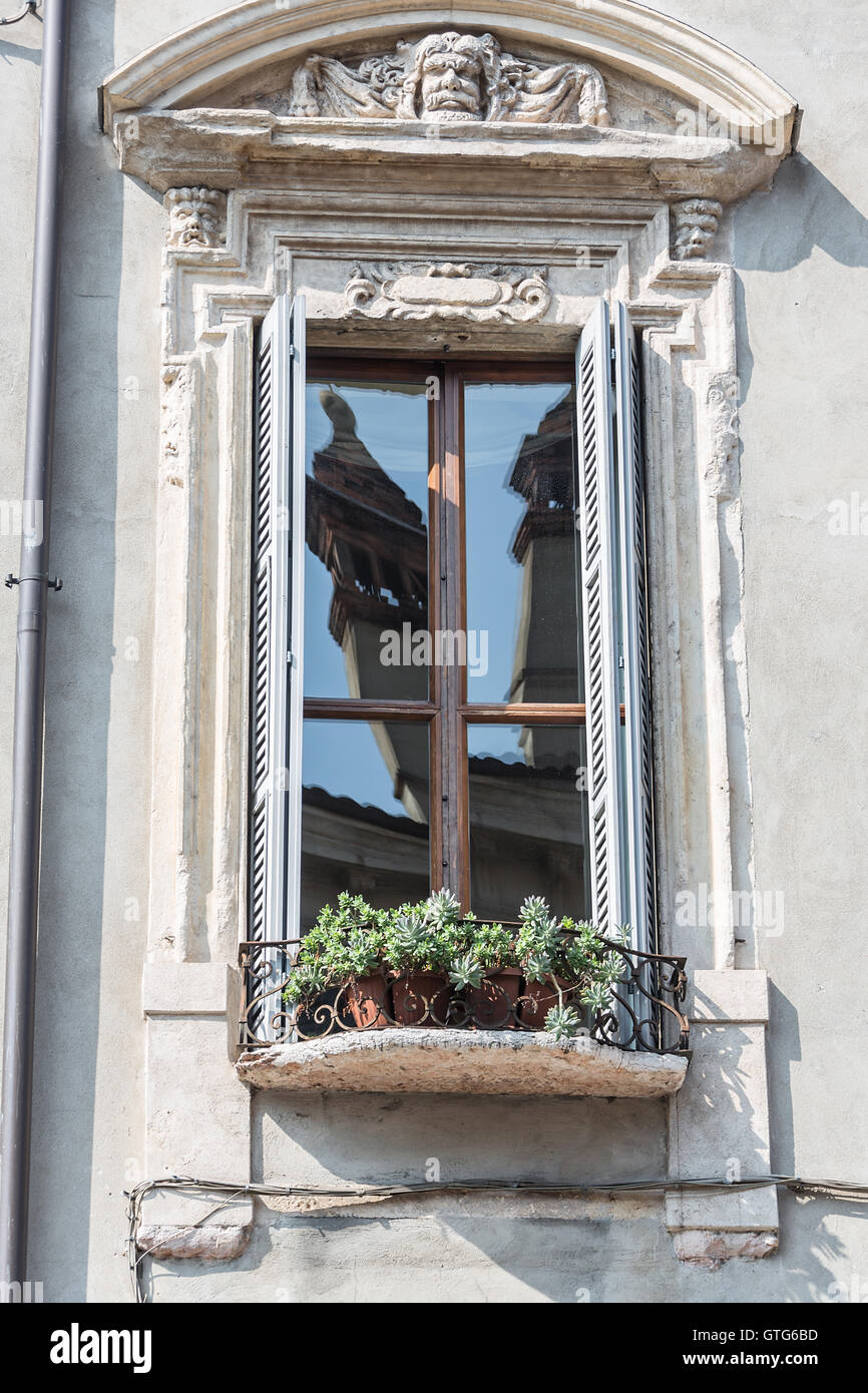 old window in the house with flowers Stock Photo - Alamy