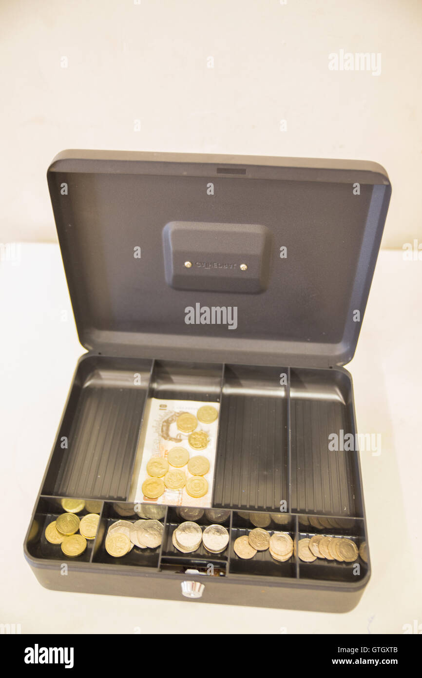 An open cash box with money inside Stock Photo Alamy