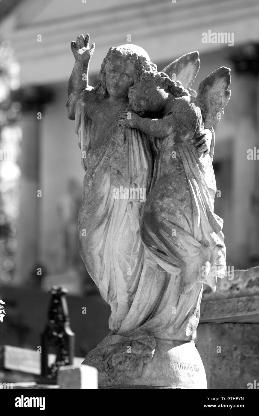 Old cemetery angel sculpture made of stone Stock Photo - Alamy