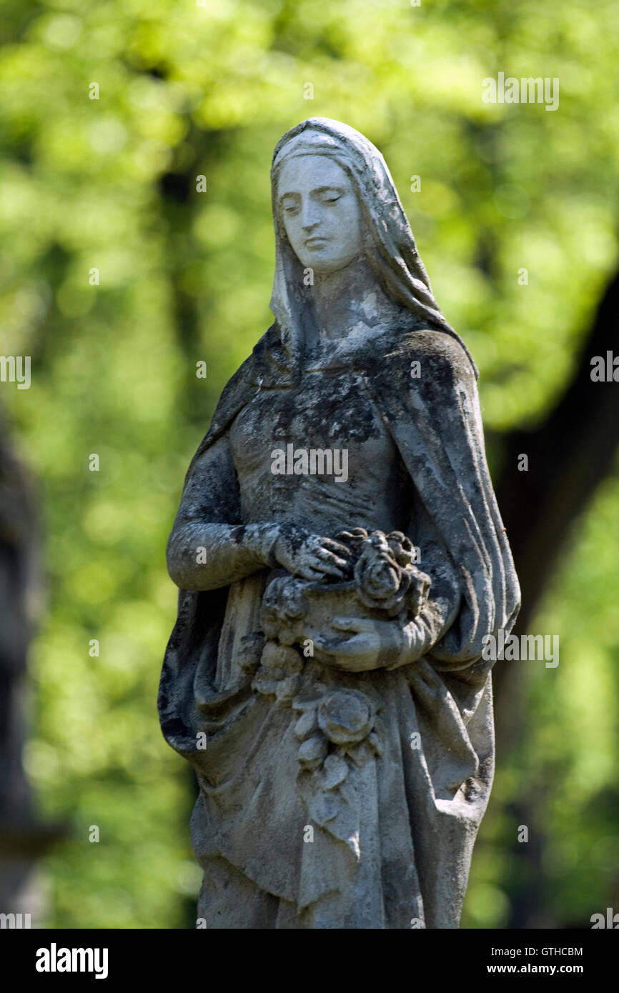 Old cemetery angel sculpture made of stone Stock Photo - Alamy