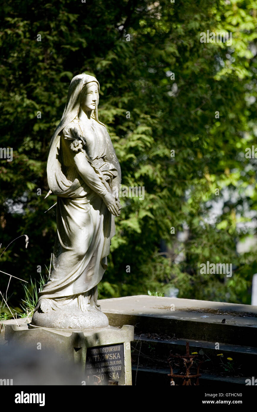 Old cemetery angel sculpture made of stone Stock Photo - Alamy