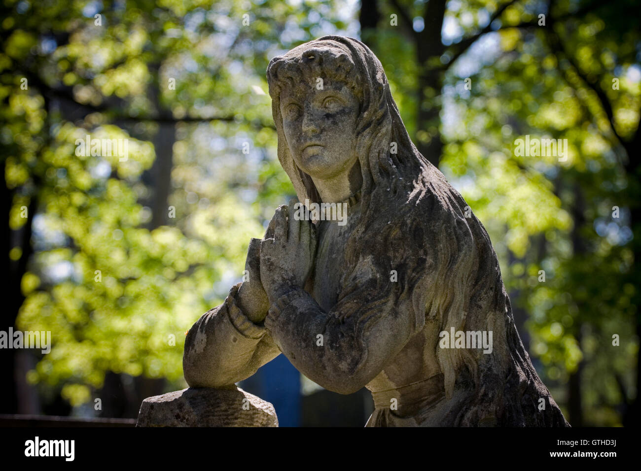 Old cemetery angel sculpture made of stone Stock Photo - Alamy