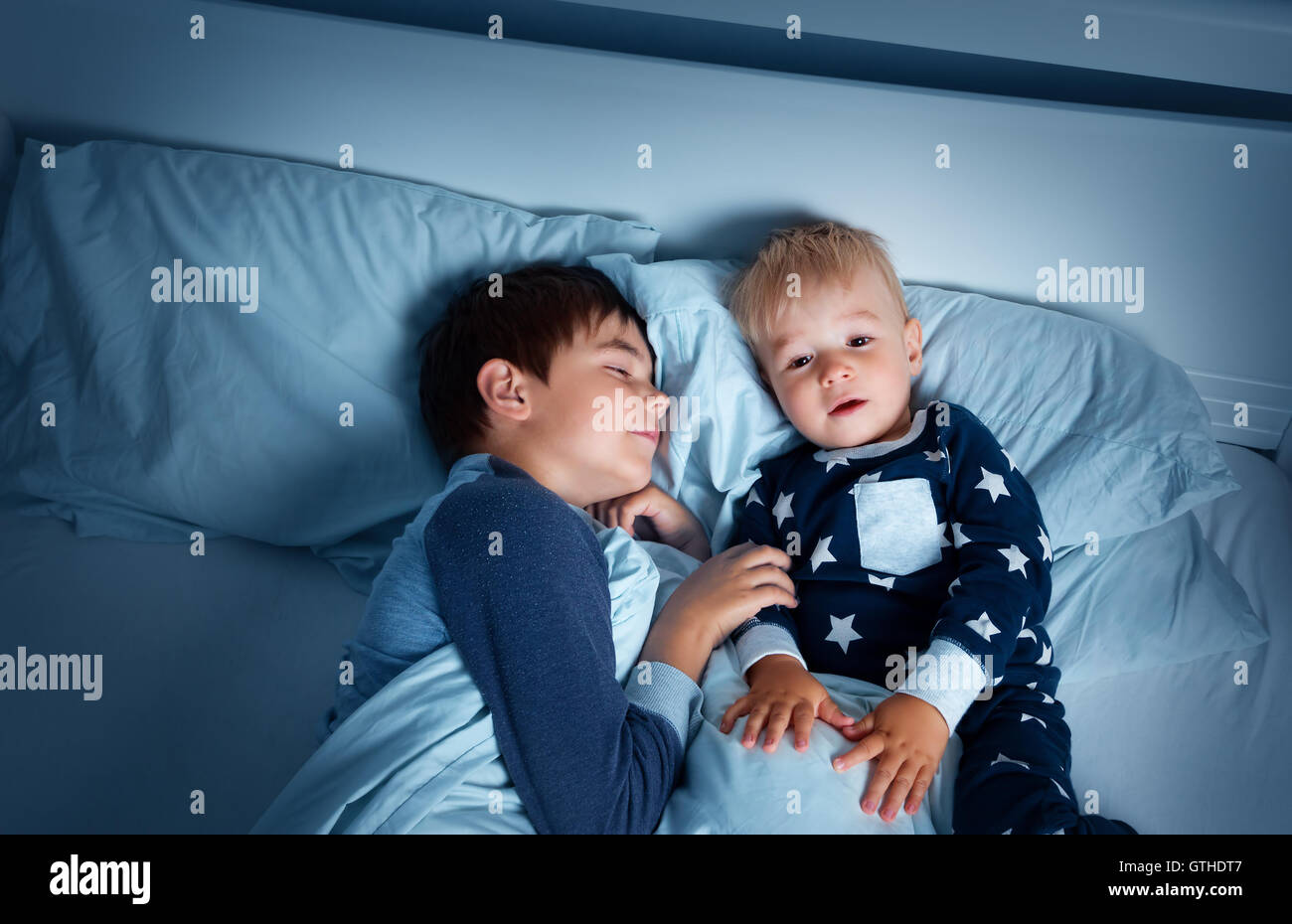 Children in bed unhappy hires stock photography and images Alamy