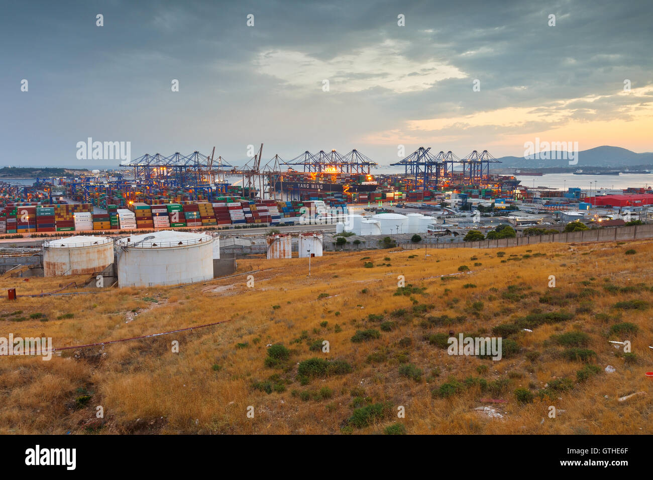 Container port of Piraeus at sunset Stock Photo - Alamy
