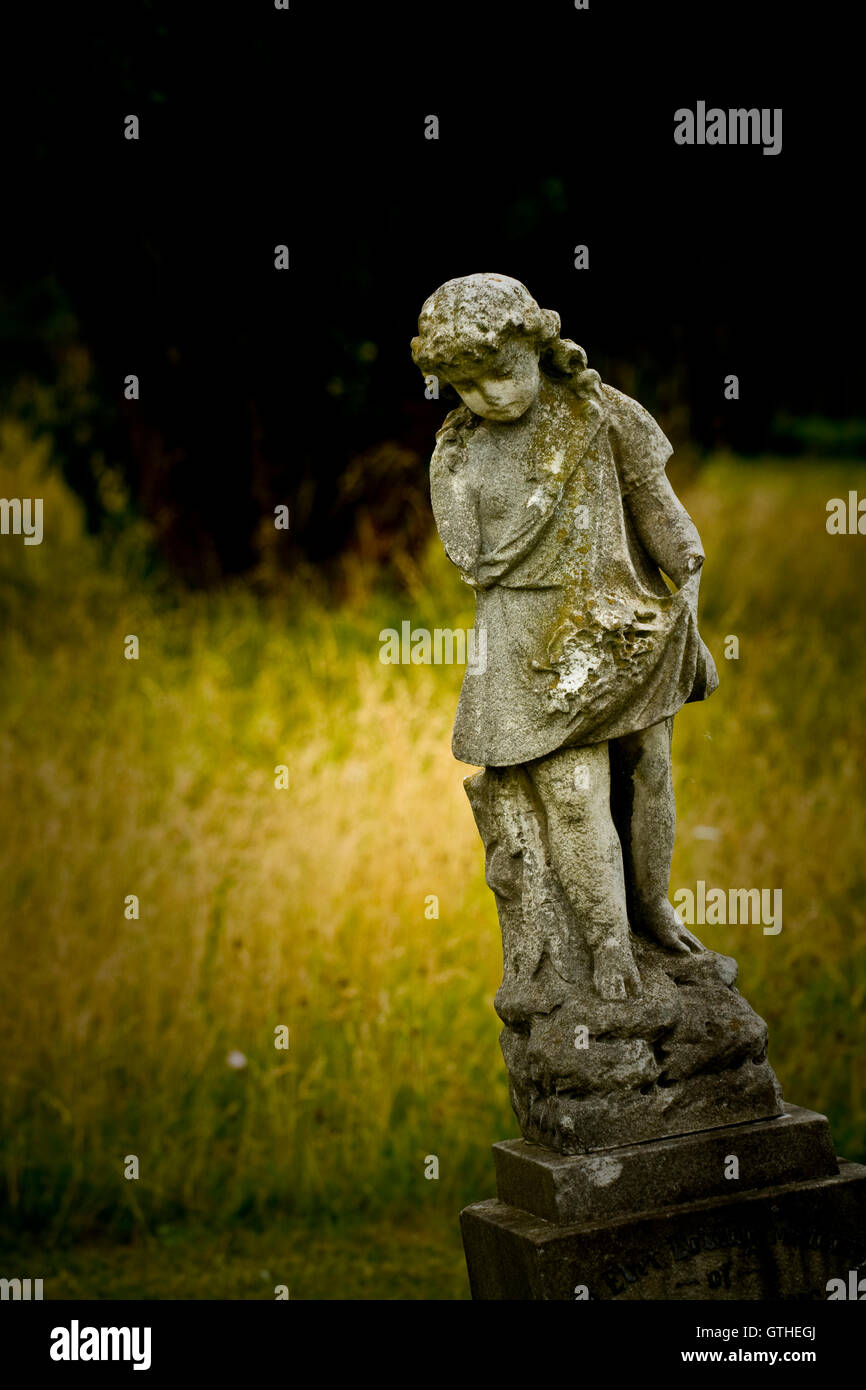 Old cemetery angel sculpture made of stone Stock Photo - Alamy