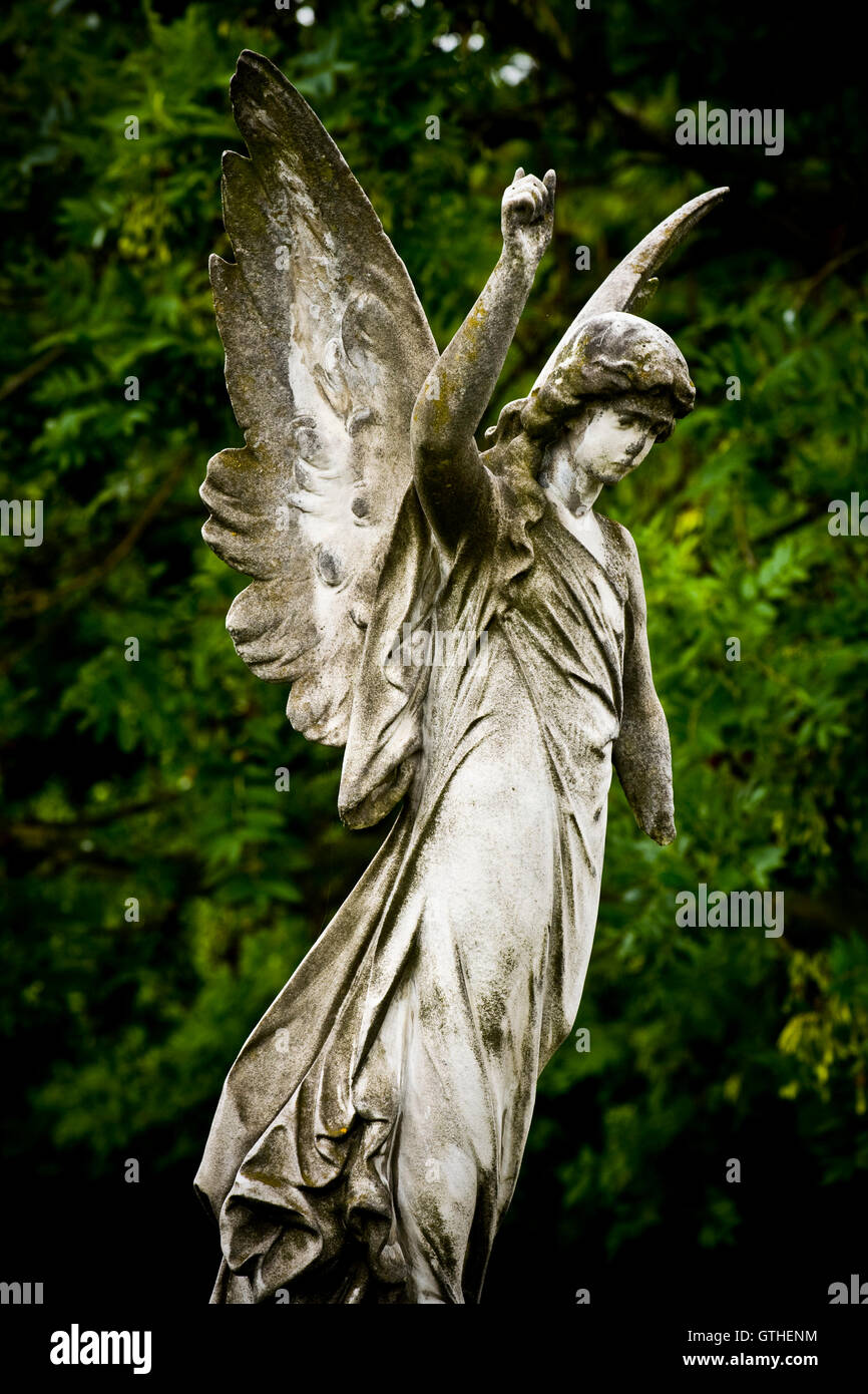 Old cemetery angel sculpture made of stone Stock Photo - Alamy