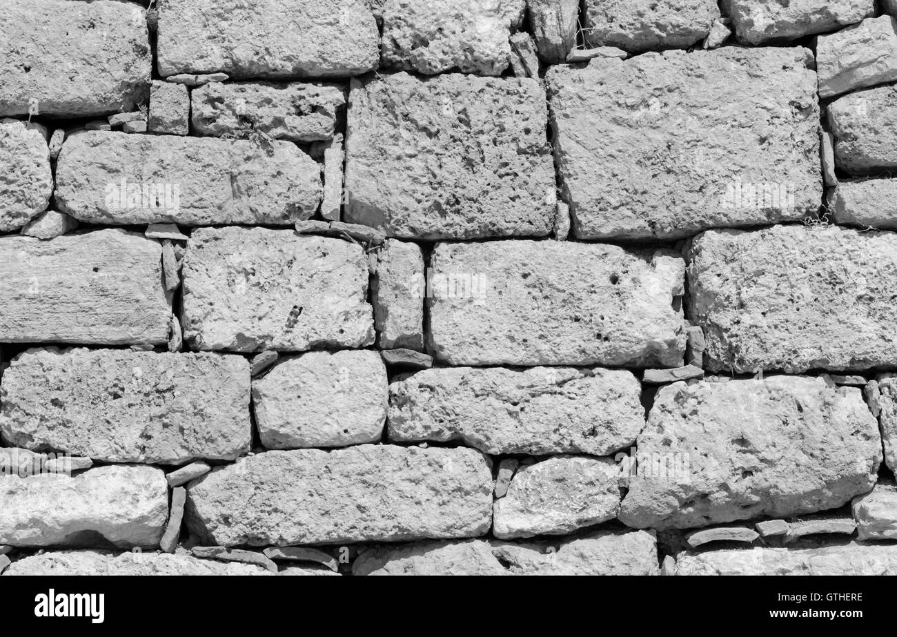Ruins of atique stone wall background Stock Photo