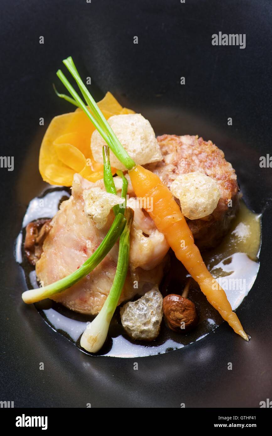 Trotters lamb with vegetables Stock Photo - Alamy