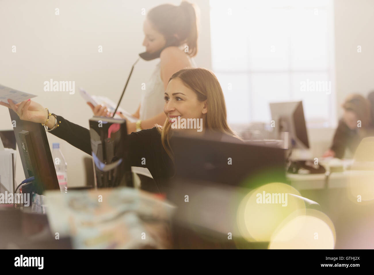 Businesswomen working at computers in office Stock Photo - Alamy