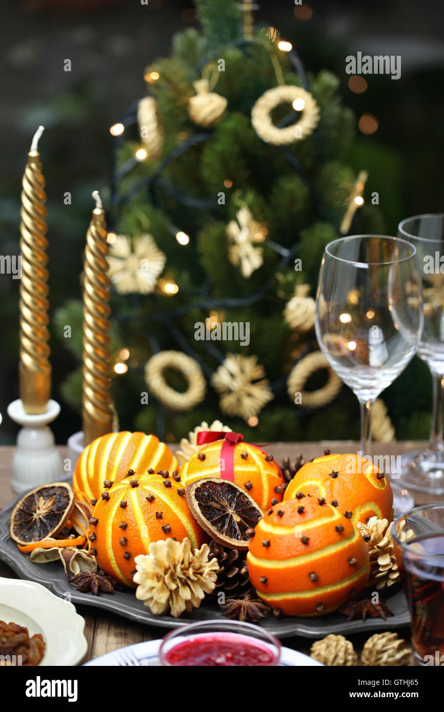 spiced orange pomander balls, scented christmas table decoration Stock ...