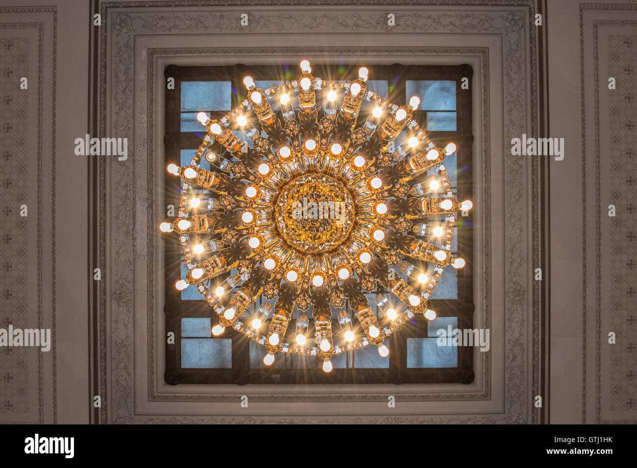 A unique perspective of one of the chandeliers at Grand Central Station in New York Stock Photo