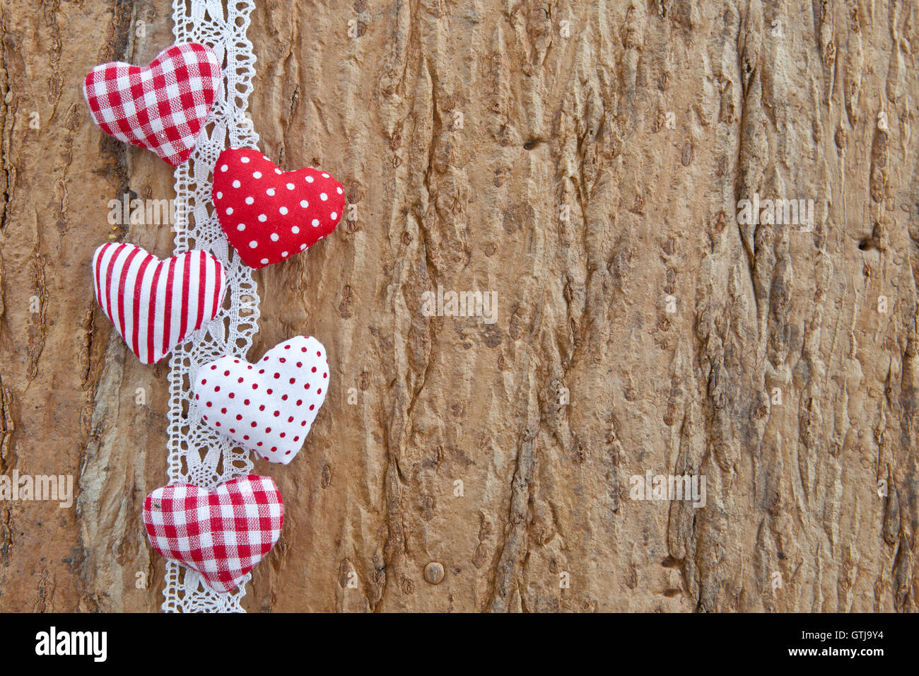 Wooden background with little hearts Stock Photo