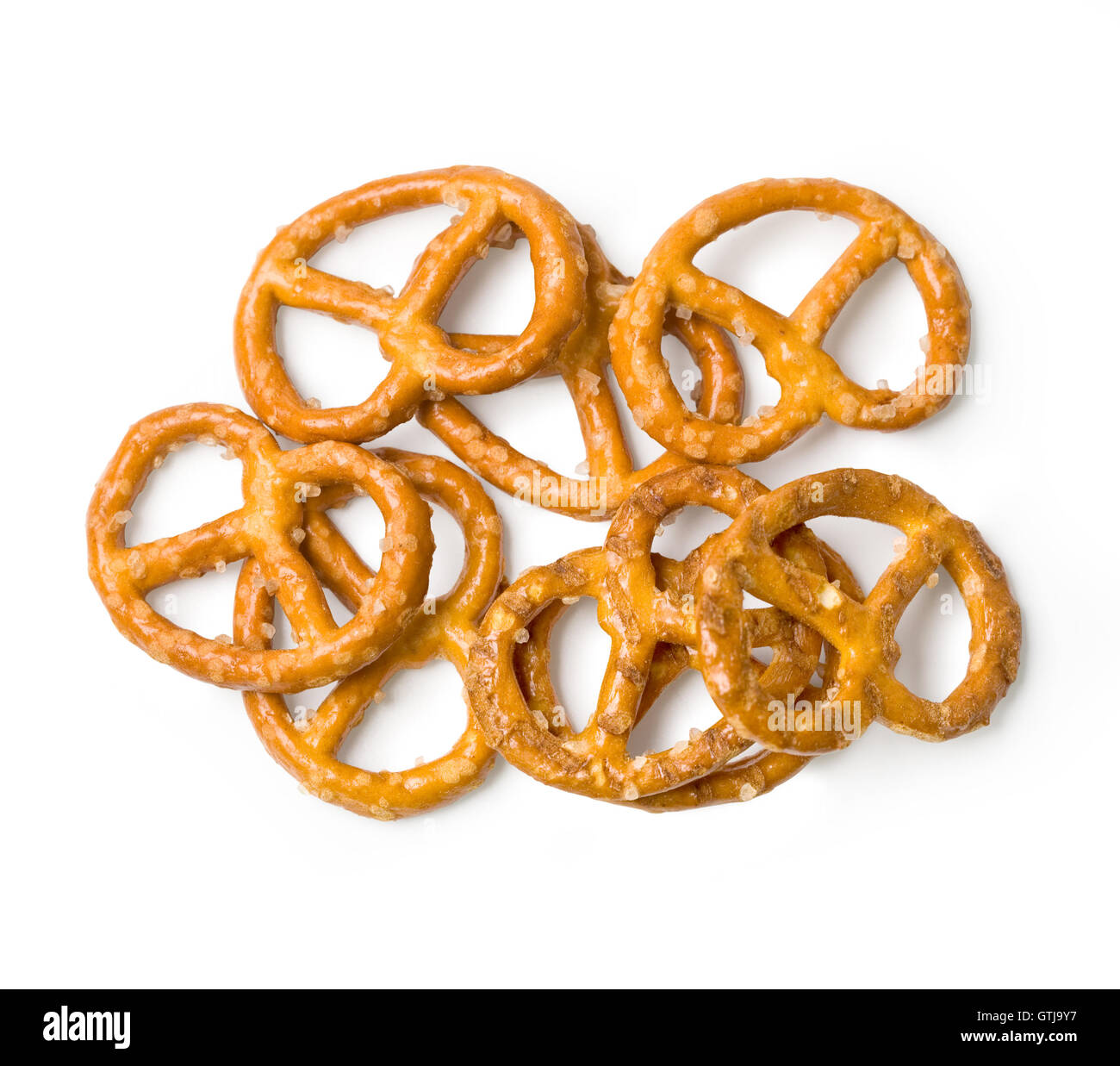 Salted pretzel, snack, color background hires stock photography and