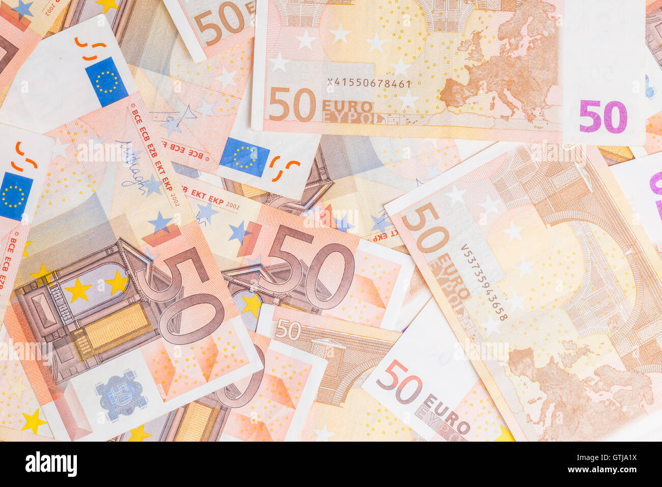 Closeup of a group of fifty euros banknote background Stock Photo