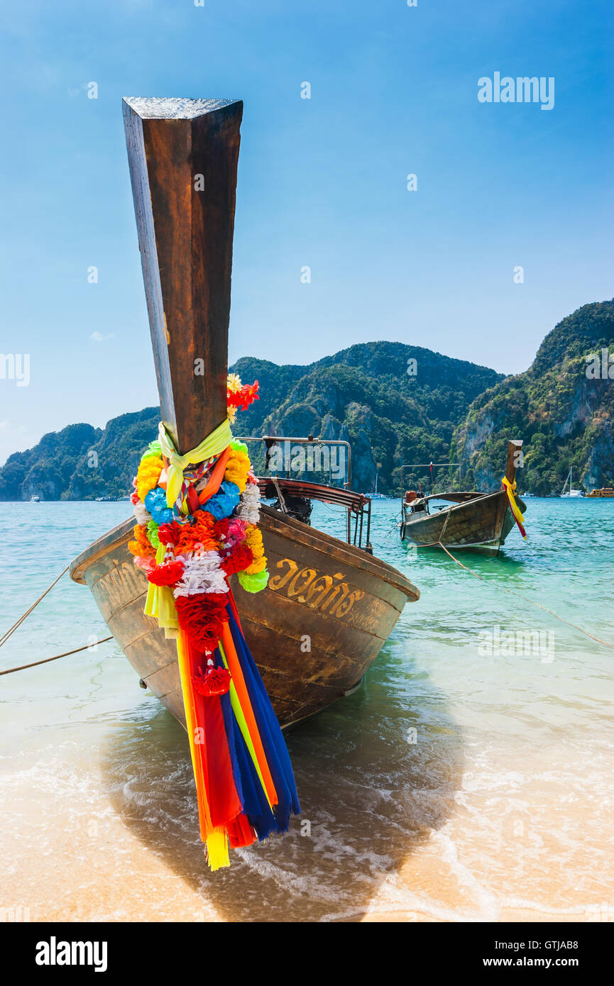 Boats at sea against the rocks in Thailand Stock Photo