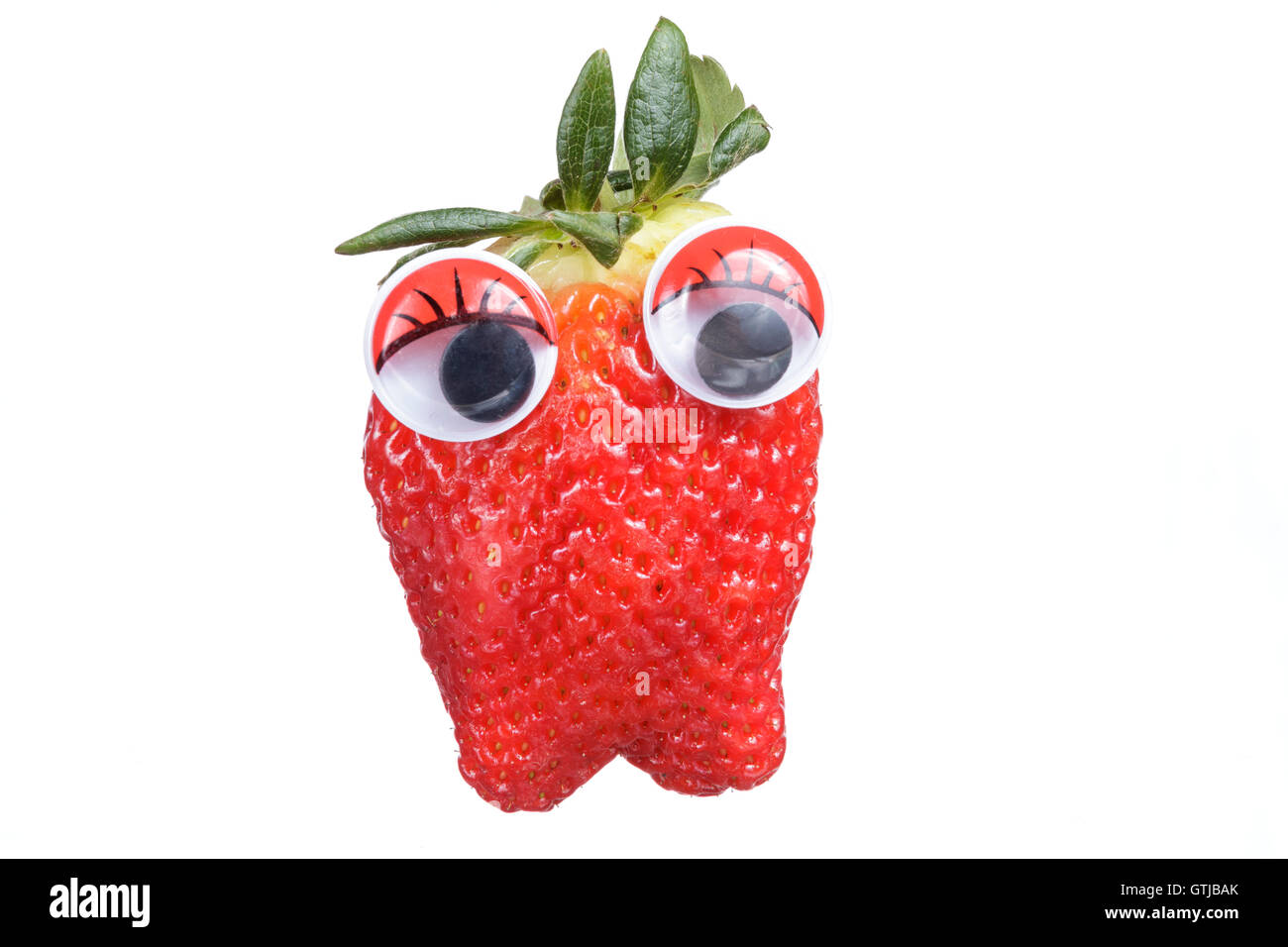 Strawberry cartoon with eyes isolated on white background Stock Photo