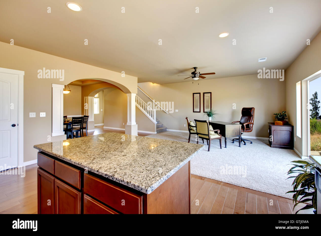 New home kitchen interior with dark brown cabinets Stock Photo - Alamy