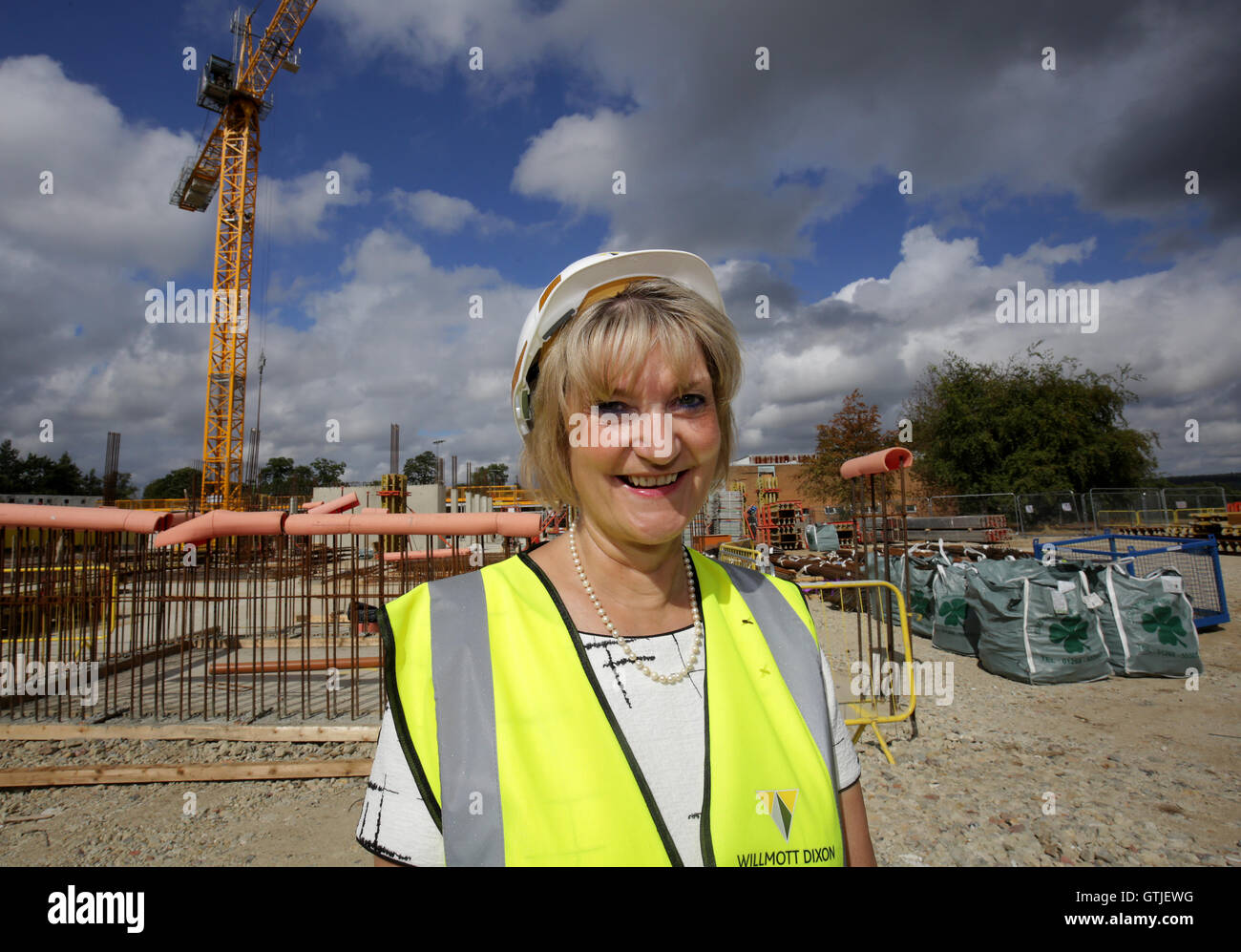 Maureen Johnson, Headteacher of the Weald of Kent Grammar School, on the construction site of the new school annexe in Sevenoaks, Kent, following a tree-planting event to mark the start of the building work. Stock Photo
