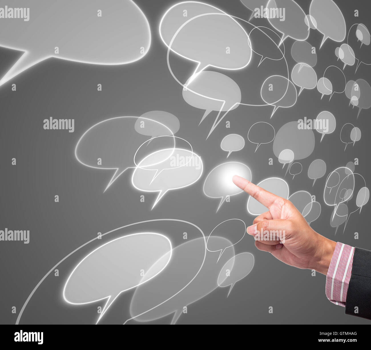 Hand pushing comment button on a touch screen interface Stock Photo - Alamy
