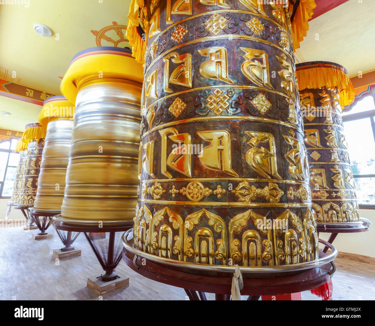 Buddhist prayer wheels Stock Photo Alamy