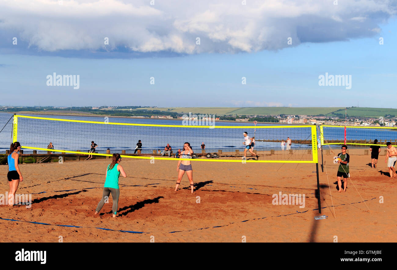 People playing volleyball on the beach, Portobello, coastal suburb of Edinburgh, Scotland, UK