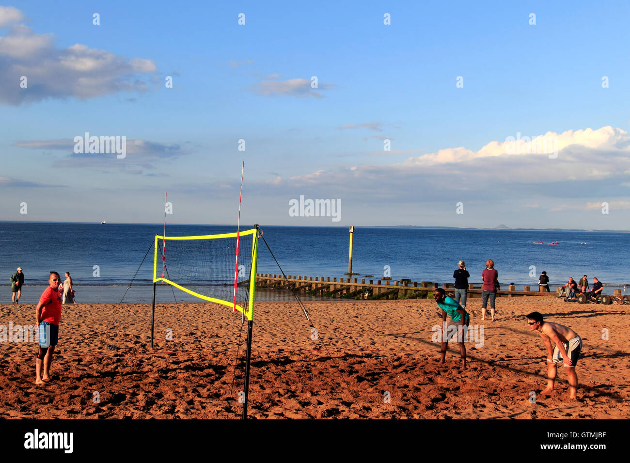 People playing volleyball on the beach, Portobello, coastal suburb of Edinburgh, Scotland, UK