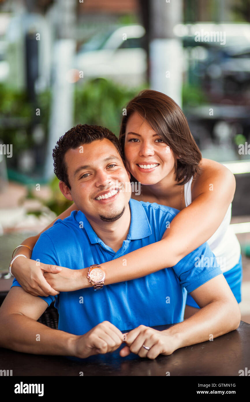Latin young couple outdoors Stock Photo Alamy