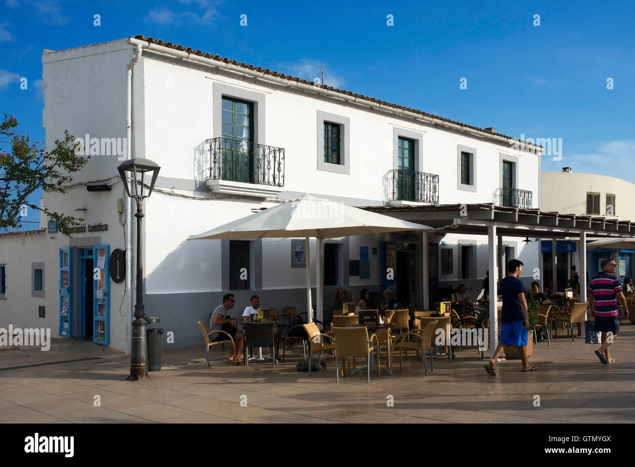Tourists, Bars and restaurants in main square of Sant Francesc Xavier, San Francisco Javier, Formentera, Pityuses, Balearic Isla Stock Photo