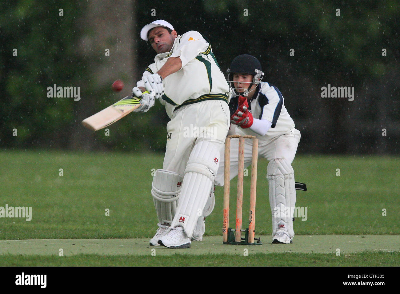 International cricket upmire Aleem Dar is seen in batting action for The Ducks Cricket Club only a few days after officiating in the first Ashes Test at Cardiff - The Ducks CC vs Island Community CC - Victoria Park Community Cricket League - 15/07/09 Stock Photo