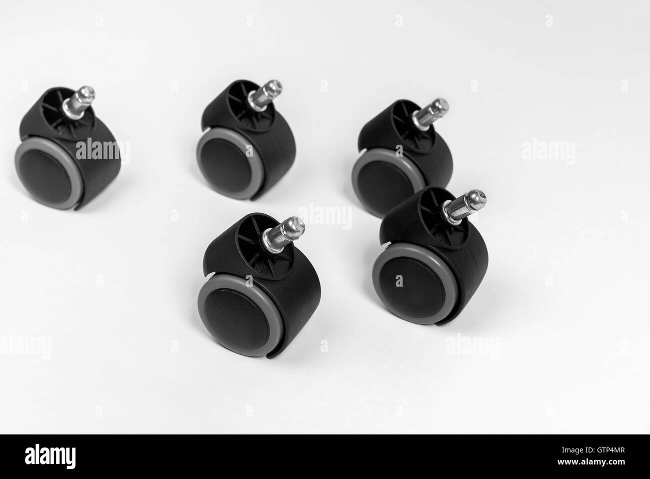 Office chair wheel five white backgruond isolate Stock Photo Alamy