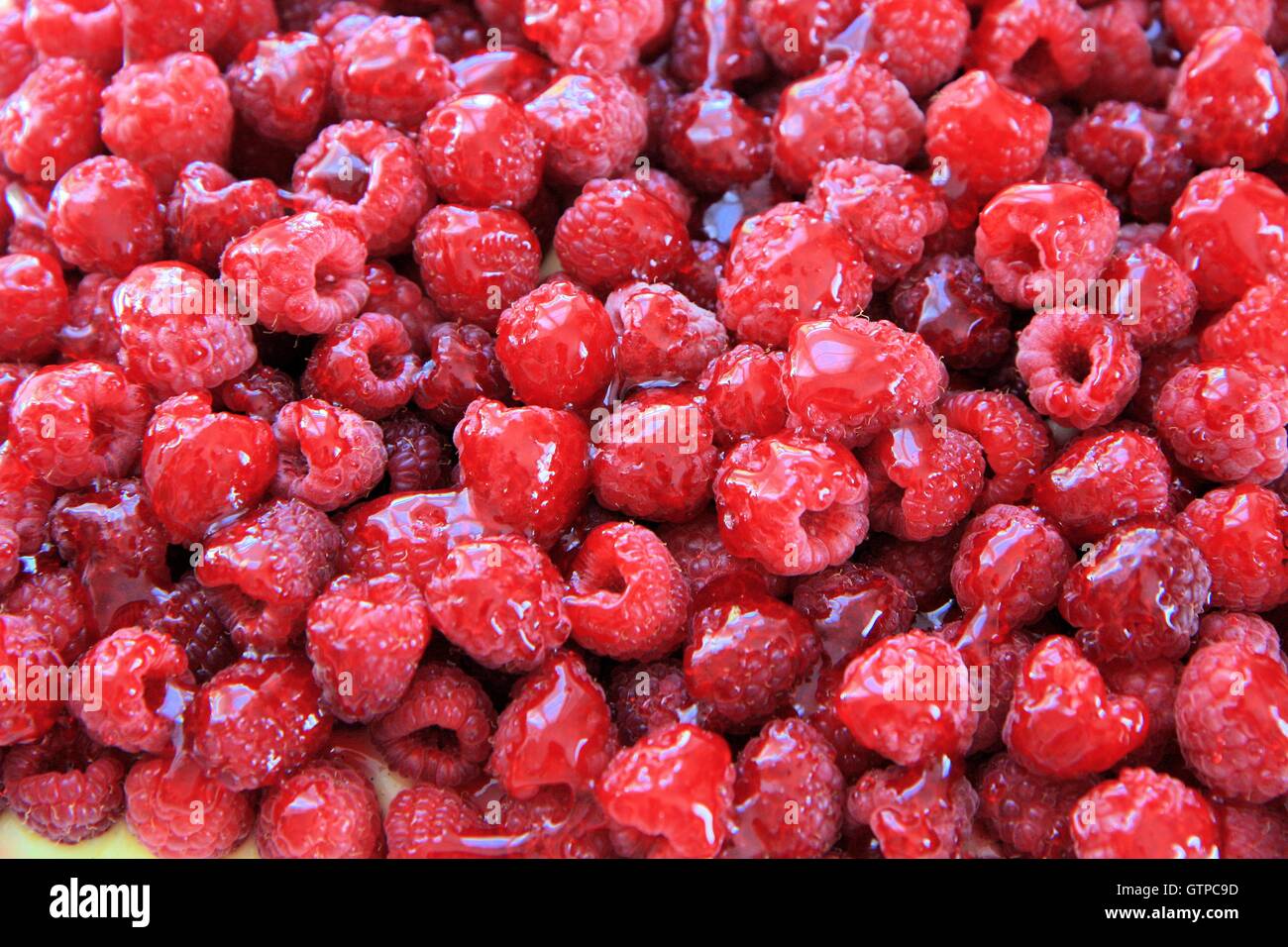 Raspberry cake topping hi-res stock photography and images - Alamy
