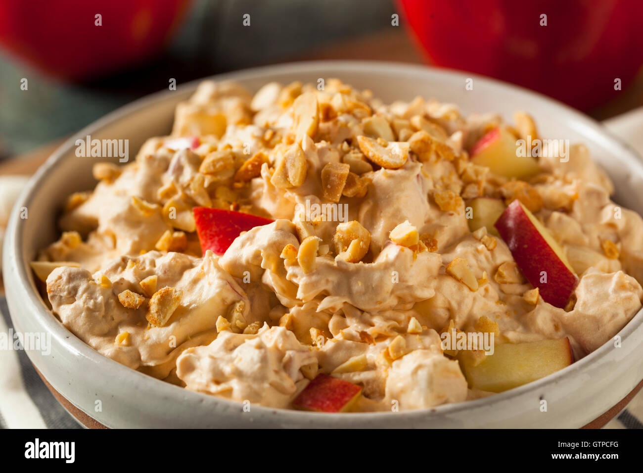 Homemade Sweet Candy Apple Salad with Peanuts and Marshmallows Stock Photo