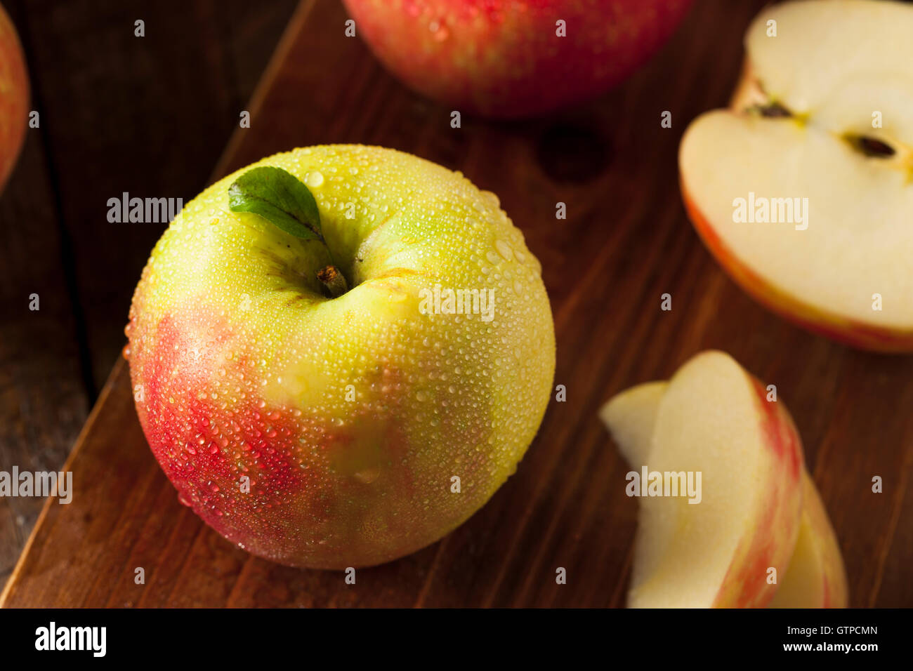 Raw Yellow Organic Opal Apples Ready to Eat Stock Photo - Alamy