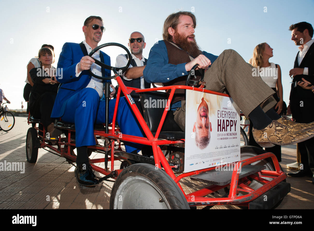 Ostend, Belgium. 09th Sep, 2016. Nic Balthazar and some of the cast from his new film 'Happy' race in a cart at the start of the film festival in Ostend. Credit:  Frederik Sadones/Pacific Press/Alamy Live News Stock Photo
